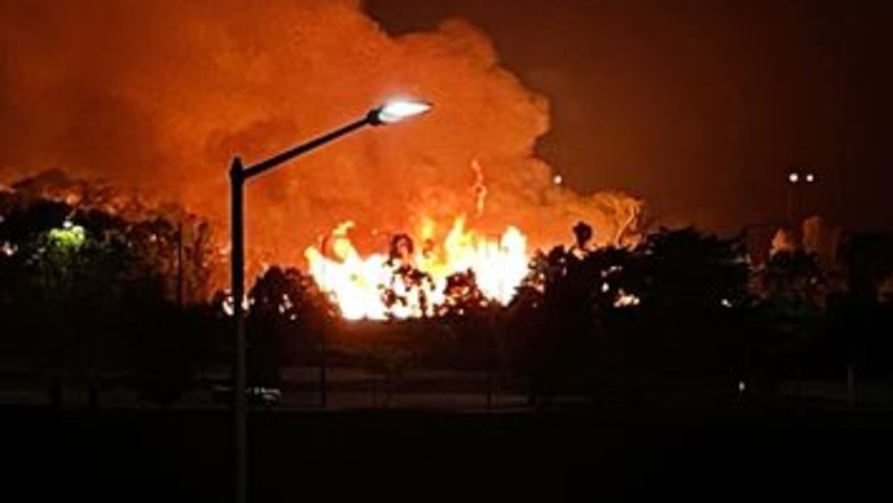 A fire between Rosebery Middle School and the Palmerston Raider Club. Picture: David Woodroffe