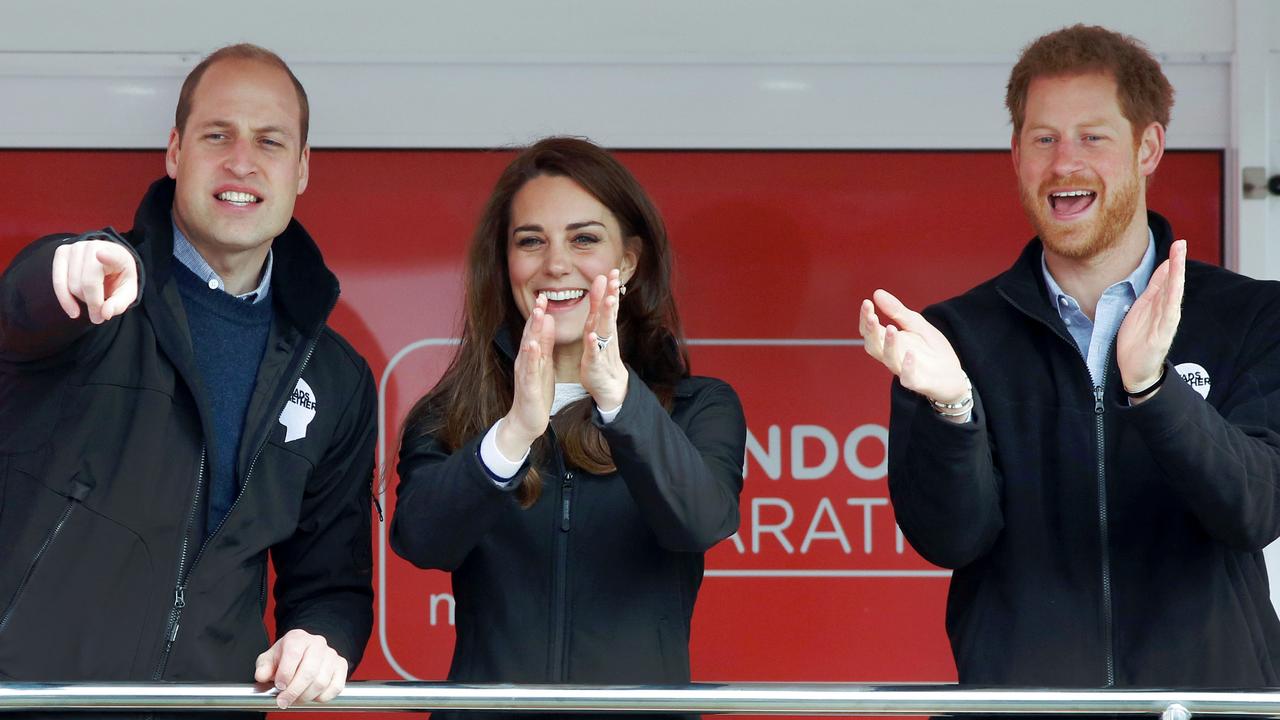 The happy threesome encourage runners after officially starting the 2017 London Marathon on April 23, 2017. Picture: Luke Macgregor/AFP