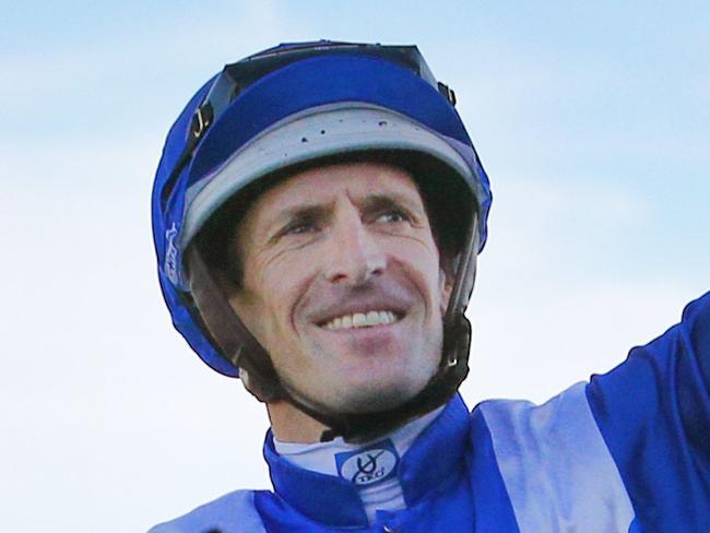 Jockey Hugh Bowman celebrates Winx winning her 17th race in a row at Royal Randwick in Sydney for the Longines Queen Elizabeth Stakes day.Picture: Richard Dobson