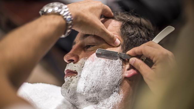 Jimmy Bartel is having his hair cut and shaved until the end of the season to raise awareness of domestic violence. Picture: Jason Edwards