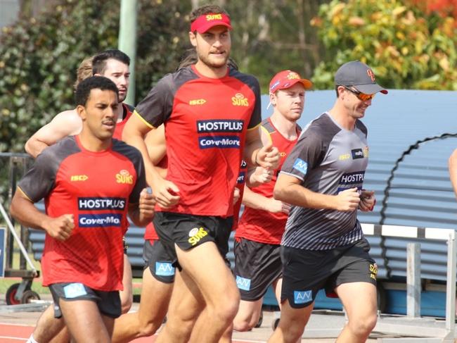 Gold Coast Suns high performance manager Alex Rigby (grey top) running with the players. Picture: Supplied.