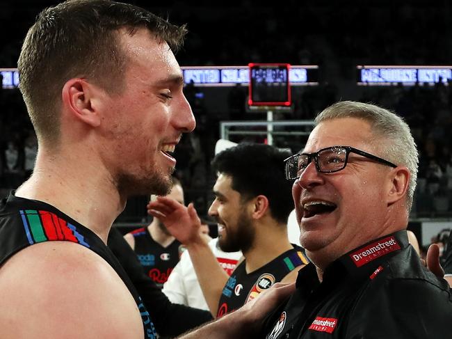 MELBOURNE, AUSTRALIA - JUNE 25:  United coachÃÂ Dean Vickerman and Mitch McCarron of Melbourne United celebrate victory after game three of the NBL Grand Final Series between Melbourne United and the Perth Wildcats at John Cain Arena, on June 25, 2021, in Melbourne, Australia. (Photo by Graham Denholm/Getty Images)