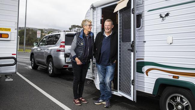 Annette and Peter Kirby pause at Heathcote, north of Melbourne, on Thursday during their race for the border. Picture: Aaron Francis