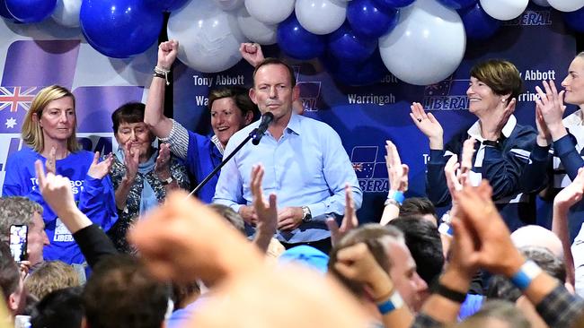 Members of the crowd are seen cheering as former Prime Minister and Warringah Liberal candidate Tony Abbott concedes defeat. Picture: (AAP Image/Bianca De Marchi)