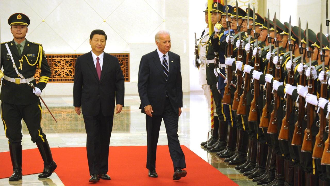 Then Chinese vice president Xi Jinping escorts then US vice president Joe Biden past Chinese honour guards during a welcome ceremony in 2011.