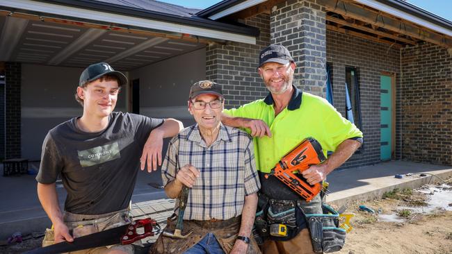 18-year-old Ben Jackson (left), a third generation apprentice carpenter, with his father Mike Jackson and grandfather David Jackson (centre). Picture Russell Millard.