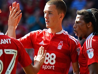 NOTTINGHAM, ENGLAND - AUGUST 06: Thomas Lam of Nottingham Forest celebrates with team mates after scoring his sides second goal during the Sky Bet Championship match between Nottingham Forest and Burton Albion at City Ground on August 6, 2016 in Nottingham, England. (Photo by Tony Marshall/Getty Images)