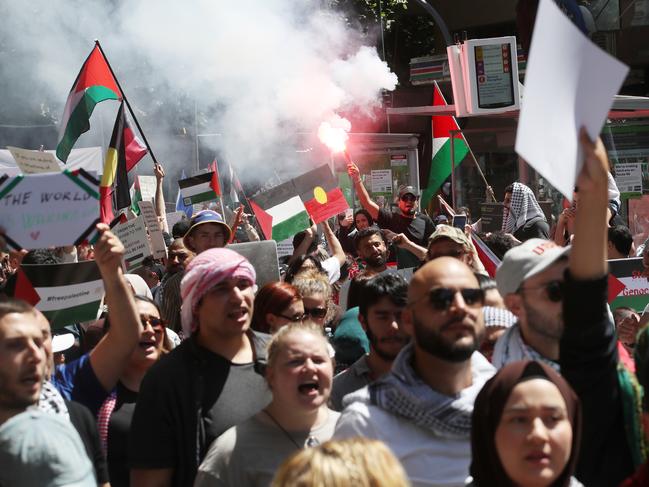 Protesters at Sunday’s rally in Melbourne CBD. Picture: David Crosling