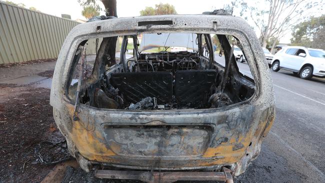 Two youths have been arrested following a break-in at Unley and this car fire at Smithfield. Picture: Tait Schmaal