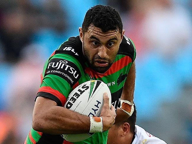 CAIRNS, AUSTRALIA - JULY 01:  Alex Johnston of the Rabbitohs attempts to get past Kyle Feldt of the Cowboys during the round 16 NRL match between the South Sydney Rabbitohs and the North Queensland Cowboys at Barlow Park on July 1, 2018 in Cairns, Australia.  (Photo by Ian Hitchcock/Getty Images)