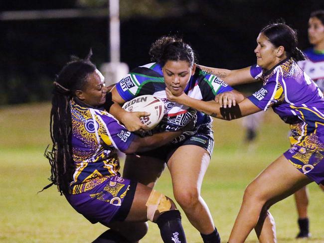 Innisfail's Toshandai Fijo is collared by Edmonton's Charmaine Moffat and Brurella Neal in the Cairns District Rugby League (CDRL) women's match between the Edmonton Storm and the Innisfail Leprechauns, held at the Smithfield Sporting Complex. Picture: Brendan Radke
