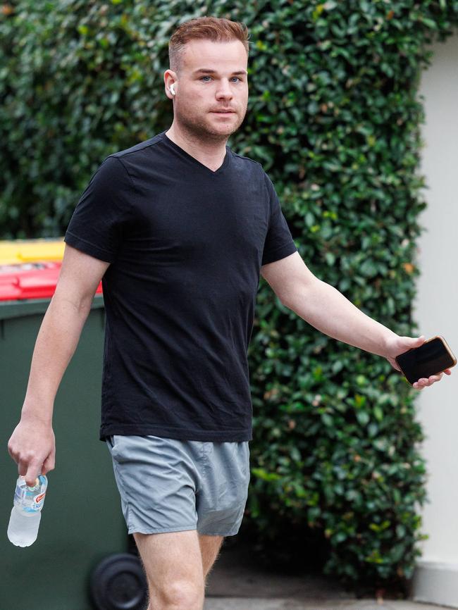 Television Producer Taylor Auerbach arrives home this morning to his Elizabeth Bay residence. Picture: David Swift