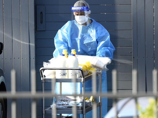 MELBOURNE, AUSTRALIA - NewsWire Photos FEBRUARY 7, 2022: Staff wearing full PPE at Twin Parks Aged Care facility at Reservoir which has had a Covid outbreak. Picture: NCA NewsWire / Andrew Henshaw