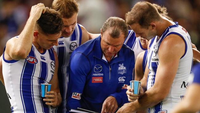 Kangaroos assistant coach John Blakey instructs his players.