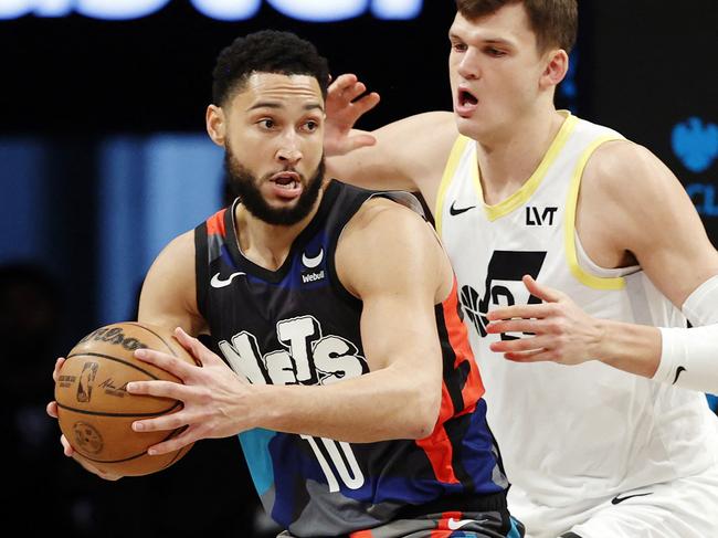 NEW YORK, NEW YORK - JANUARY 29: Ben Simmons #10 of the Brooklyn Nets dribbles against Walker Kessler #24 of the Utah Jazz during the first half at Barclays Center on January 29, 2024 in the Brooklyn borough of New York City. NOTE TO USER: User expressly acknowledges and agrees that, by downloading and/or using this Photograph, user is consenting to the terms and conditions of the Getty Images License Agreement.   Sarah Stier/Getty Images/AFP (Photo by Sarah Stier / GETTY IMAGES NORTH AMERICA / Getty Images via AFP)