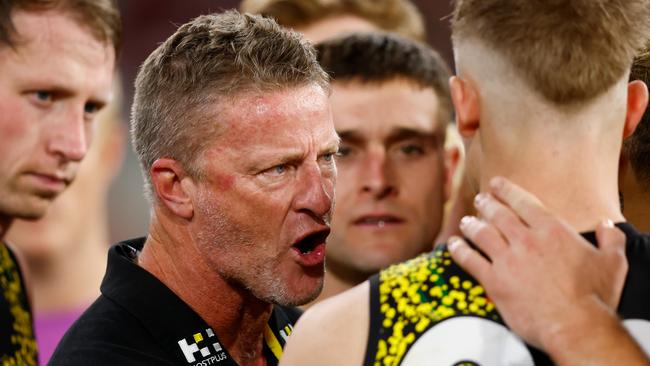 MELBOURNE, AUSTRALIA - APRIL 24: Damien Hardwick, Senior Coach of the Tigers addresses his players during the 2023 AFL Round 06 match between the Melbourne Demons and the Richmond Tigers at the Melbourne Cricket Ground on April 24, 2023 in Melbourne, Australia. (Photo by Dylan Burns/AFL Photos via Getty Images)