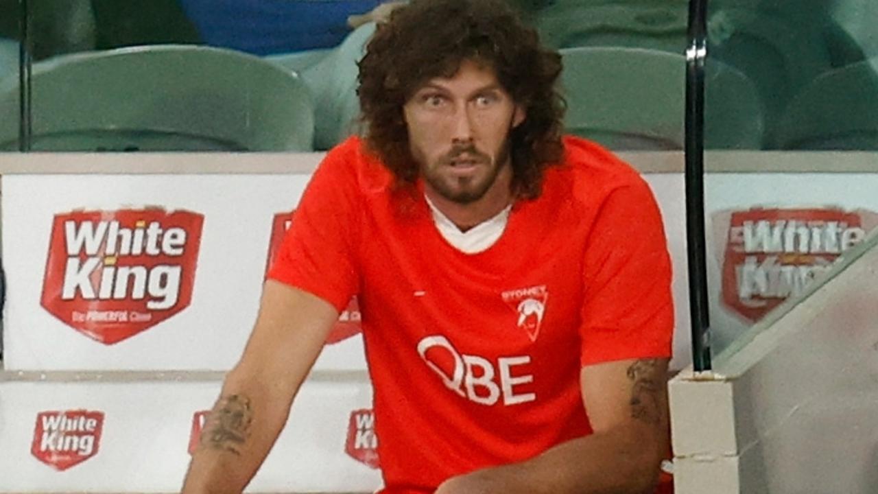 Tom Hickey looks on after being subbed from the match. Picture: Michael Willson/AFL Photos via Getty Images