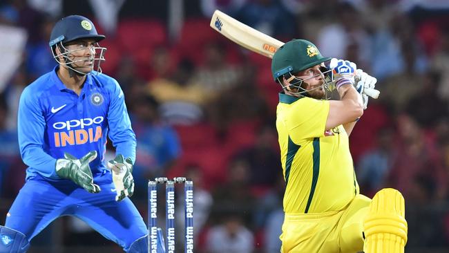 Aaron Finch hits out on his way to 37 against India.