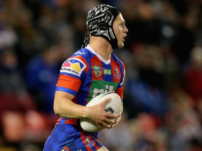 NEWCASTLE, AUSTRALIA - AUGUST 03: Kalyn Ponga of the Knights runs the ball during the round 21 NRL match between the Newcastle Knights and the Wests Tigers at McDonald Jones Stadium on August 3, 2018 in Newcastle, Australia.  (Photo by Ashley Feder/Getty Images)