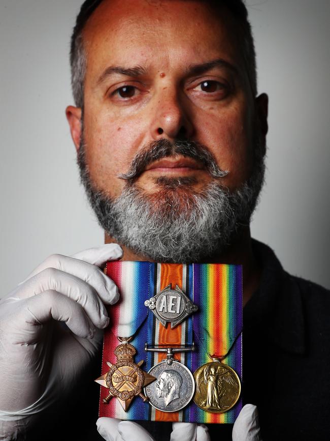 Dr James Hunter with service medals of JB Thomas who was onboard HMAS AE1. Photo: John Feder