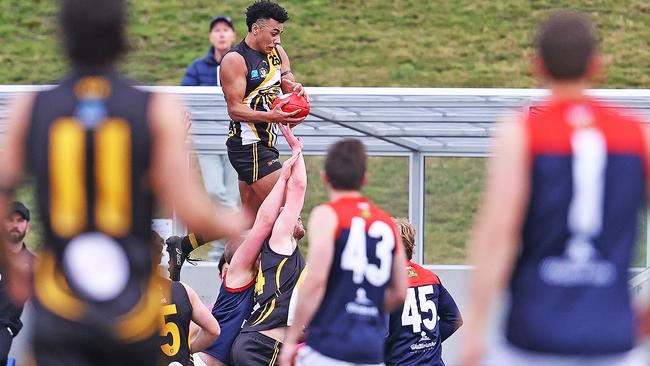 Elijah Reardon takes a huge mark on the wing in the TSL clash between the Tigers v North Hobart at Kingston Twin Ovals. Picture: ZAK SIMMONDS