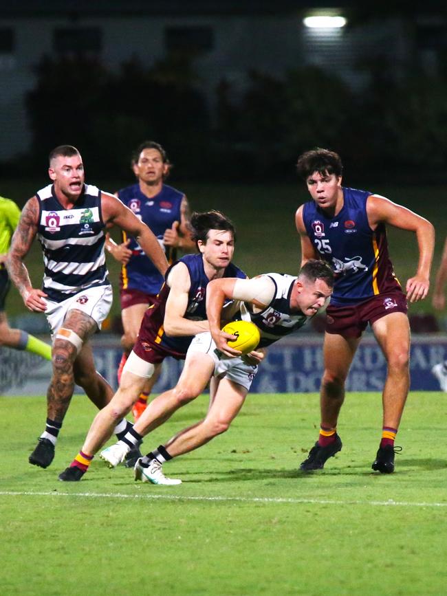 Pictured (l-r): Croc Harvey Moore, Lion Keith Brick, Croc Daniel Davidson and Lion Max Hoffman. Cairns City Lions v Port Douglas Crocs at Cazalys Stadium. Elimination Final. AFL Cairns 2024. Photo: Gyan-Reece Rocha