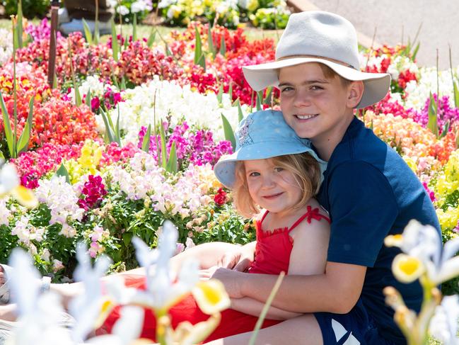 Eliza and Hugh Swaffield in the Botanic Gardens display in Queens Park during the Carnival of Flowers, Sunday, September 22, 2024. Picture: Bev Lacey