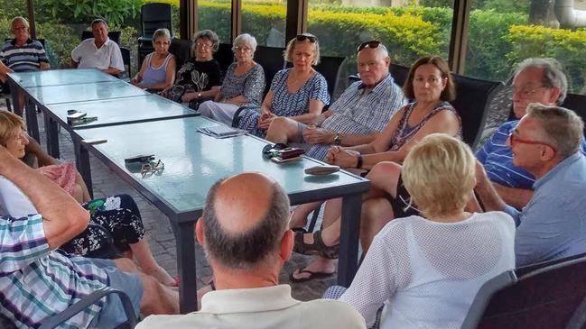 Eddy Sarroff (far right) talking to Southport residents about their protest against a second Gold Coast casino.