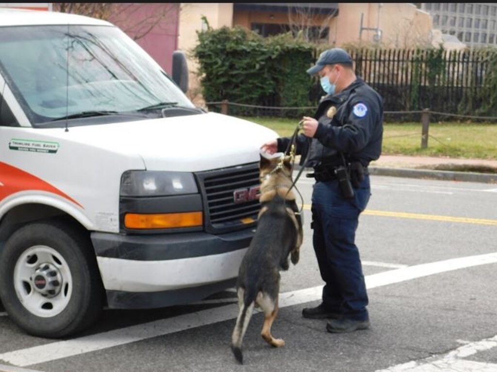 A policeman checks a truck making a delivery to Capitol Hill. Picture: Nathan Vass/News Corp