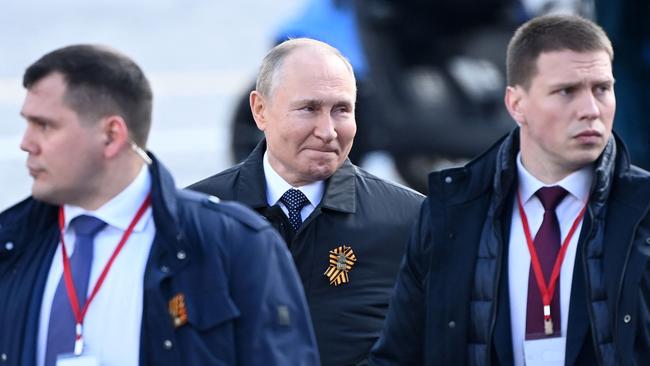 Russian President Vladimir Putin with his security team. Picture: Kirill Kudryavtsev / AFP