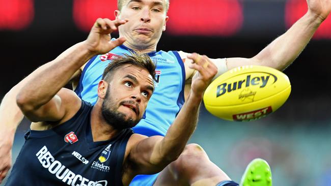 Determined ... Rigby Barnes hunts the ball against Sturt in the qualifying final. Picture: Tom Huntley