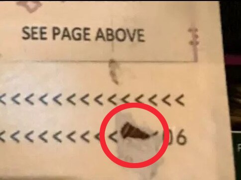 The tear in Mr Lane's passport.