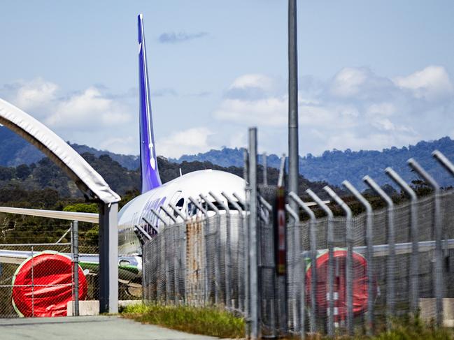 Bonza plane sitting on the tarmac at Gold Coast Airport ready to go while their Canadian crew twiddle their thumbs at the hotel pool awaiting CASA approval.NO BYLINE