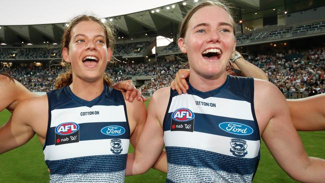 Nina Morrison (left) singing the club song after the Cats’ Round 1 win. Picture: Getty Images