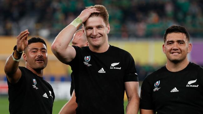 New Zealand players (from left) Richie Mo'unga, Jordie Barrett and Codie Taylor celebrate their victory over Ireland. Picture: AFP