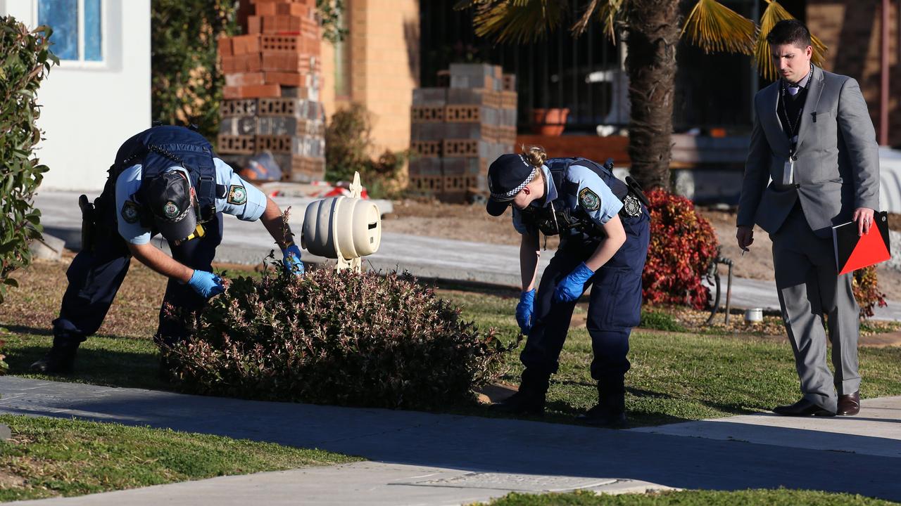 Police at St Clair Avenue in St Clair the day after Rita Camilleri was beheaded by her daughter and her body mutilated. Picture: David Swift.