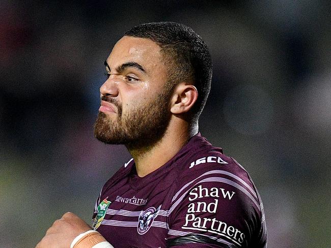 X of the Sea Eagles is tackled by x of the Titans during the Round 23 NRL match between the Manly-Warringah Sea Eagles and the Gold Coast Titans at Lottoland in Sydney, Friday, August 17, 2018. (AAP Image/Dan Himbrechts) NO ARCHIVING, EDITORIAL USE ONLY