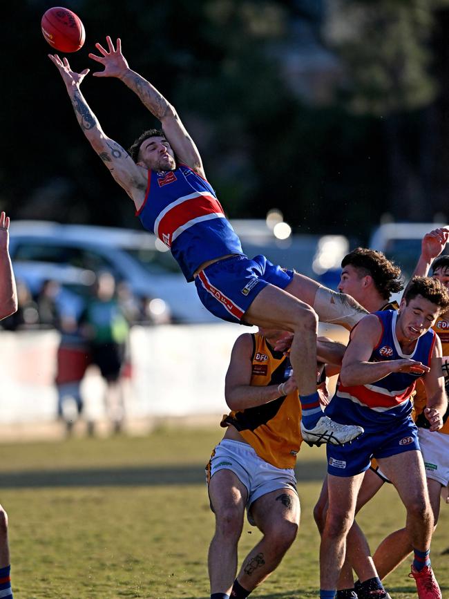 Keilor’s Jesse Wallin attempts a screamer. Picture: Andy Brownbill