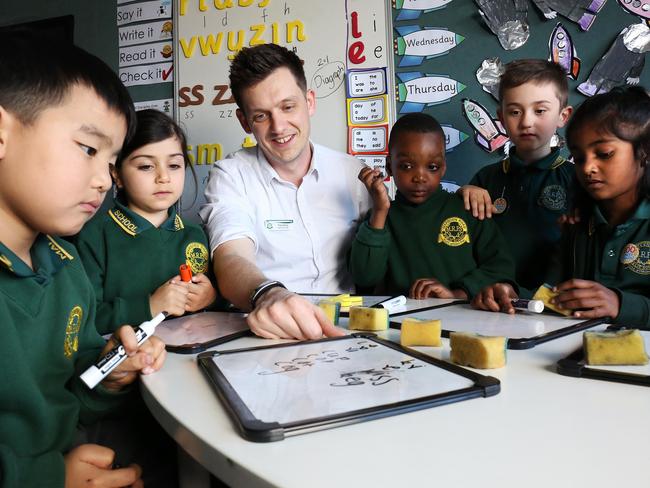 01/08/2018: Teacher Troy Verey with prep students at Marsden Road Public School in Liverpool, western Sydney. He has lamented the inadequate teacher training he received, during a high-profile debate in which he implored fellow educators to stop leaving reading to chance. Arguing for the need for phonics to be taught in a systematic way.Pic by James Croucher