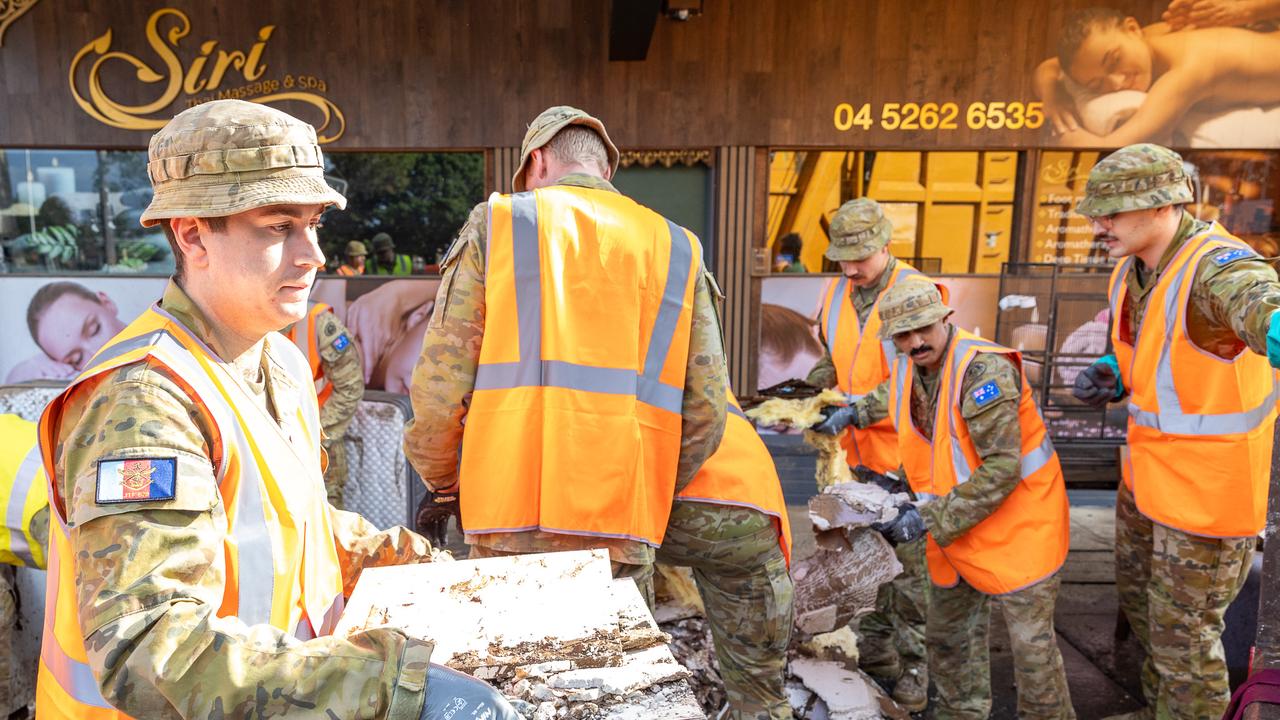 Troops join flood clean-up as insurance claims surge