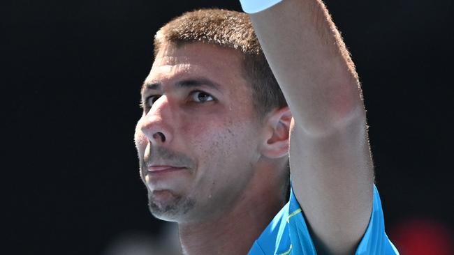 MELBOURNE, AUSTRALIA - JANUARY 15: Alexei Popyrin of Australia celebrates match point in their round one singles match against Marc Polmans of Australia during the 2024 Australian Open at Melbourne Park on January 15, 2024 in Melbourne, Australia. (Photo by Morgan Hancock/Getty Images)