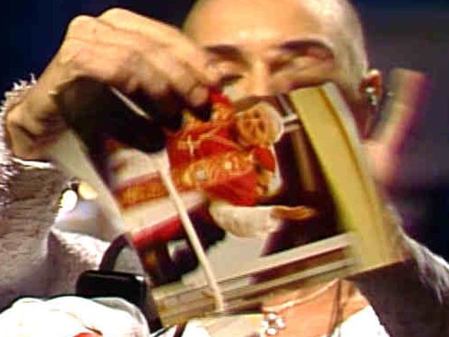 Irish singer Sinead O'Connor tearing up a picture of the Pope on Saturday Night Live 03/10/1992.