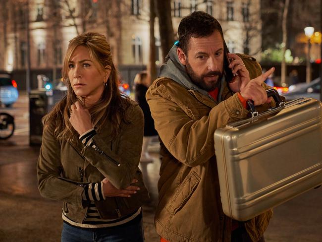 Murder Mystery 2. (L-R) Jennifer Aniston as Audrey Spitz and Adam Sandler as Nick Spitz in Murder Mystery 2. Cr. Scott Yamano/Netflix © 2022.