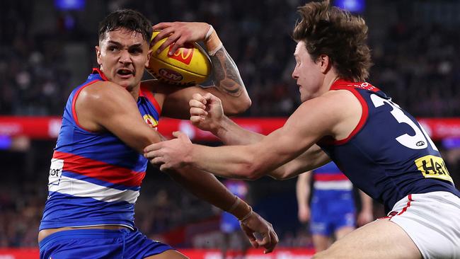 MELBOURNE, AUGUST 2, 2024: 2024 AFL Football - Round 21 - Western Bulldogs V Melbourne Demons at Marvel Stadium. Jamarra Ugle-Hagan of the Bulldogs under pressure. Picture: Mark Stewart