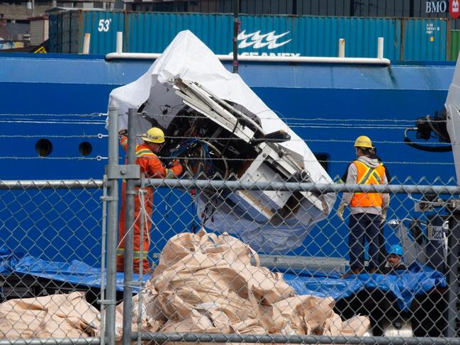 ONE TIME WEB USE FOR NEWS.COM.AU ONLY - FEES APPLY -  Mandatory Credit: Photo by Canadian Press/Shutterstock (13988728b) Debris from the Titan submersible, recovered from the ocean floor near the wreck of the Titanic, is unloaded from  the ship Horizon Arctic at the Canadian Coast Guard pier in St. JohnÃÃ´s on Wednesday, June 28, 2023. Cda-Titanic-Search, st.john's, Canada - 28 Jun 2023  Picture: Canadian Press/Shutterstock