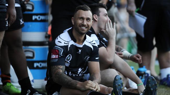 Quade Cooper on the sideline during a Souths v Wests club rugby game.