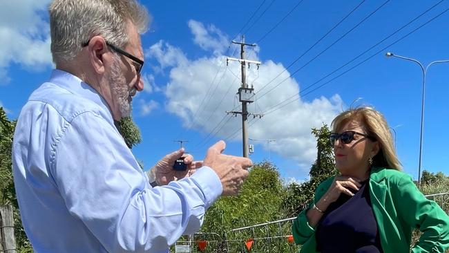 Coomera LNP MP Michael Crandon and Deputy Mayor Donna Gates discuss a petition calling for immediate construction of next stages of the Coomera Connector.