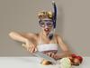 TASTE MATT PRESTON FEB 3 ... Young blonde woman cutting onion in diving scuba mask for protect eyes
