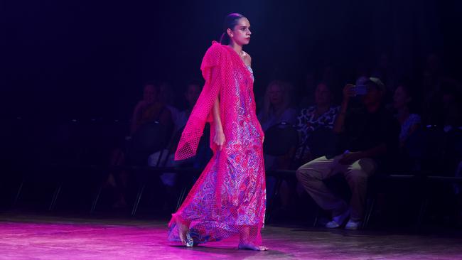 A model showcases the Taking Shape collection from designer Elverina Johnson at the Cairns Indigenous Art Fair fashion performance, Woven, held at the Tanks Arts Centre, Edge Hill. Picture: Brendan Radke