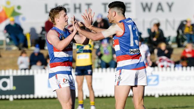 Nick Gillard reacts after kicking a crucial goal late goal in Central District’s upset victory at Woodville Oval. Picture: AAP Image/Morgan Sette)